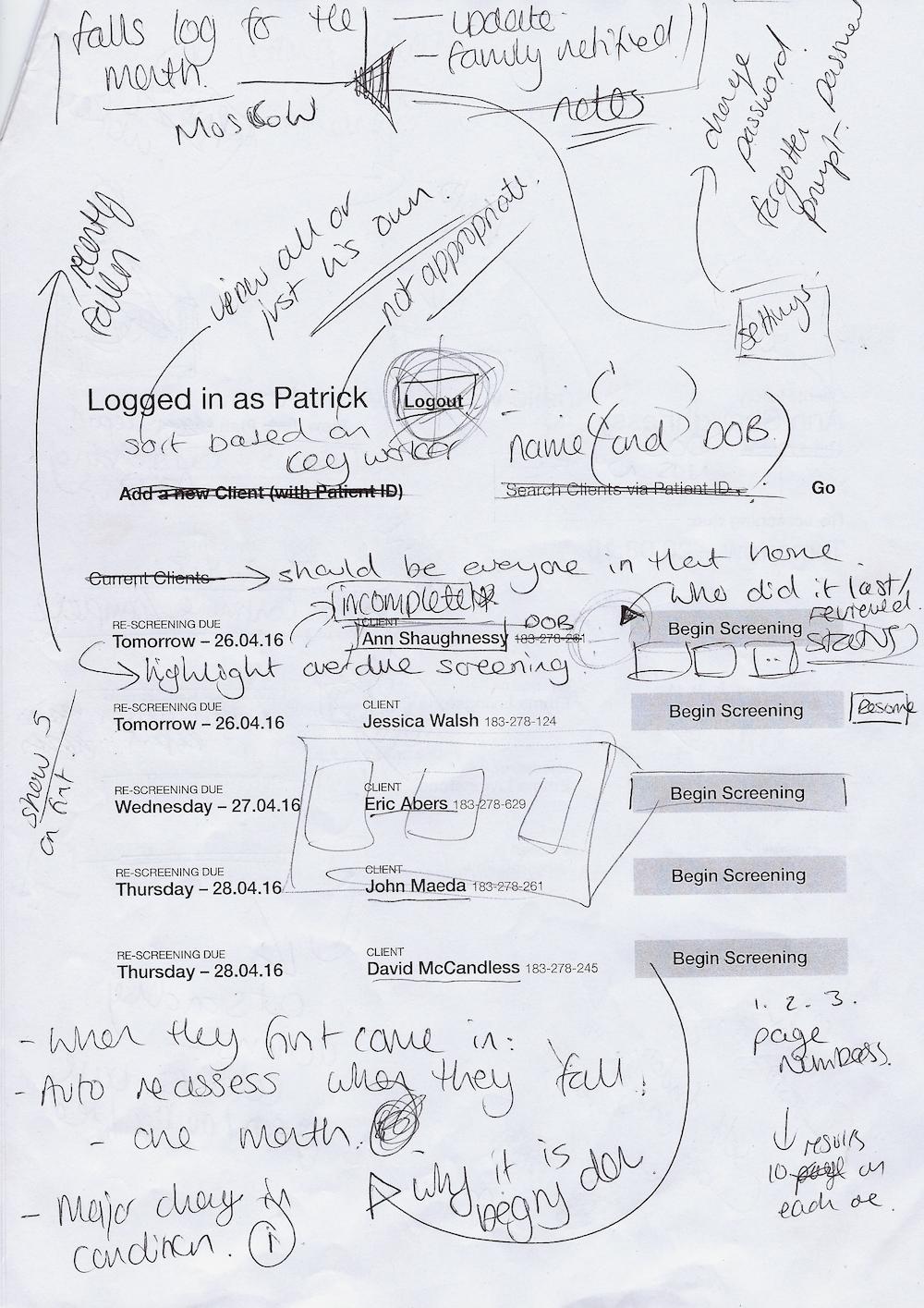 A printed wireframe with lots of annotations drawn over it